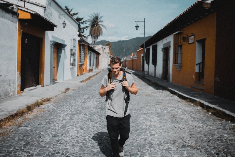 This is me, Perry Grone. I was walking through the empty streets of Antigua, Guatemala in the morning and my friend took this picture of me. I’m probably thinking about getting pancakes because I’m hungry or something like that…